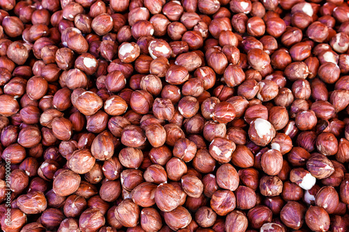 Nut background of hazelnut fruits. Food background. Top view of hazelnut nuts.