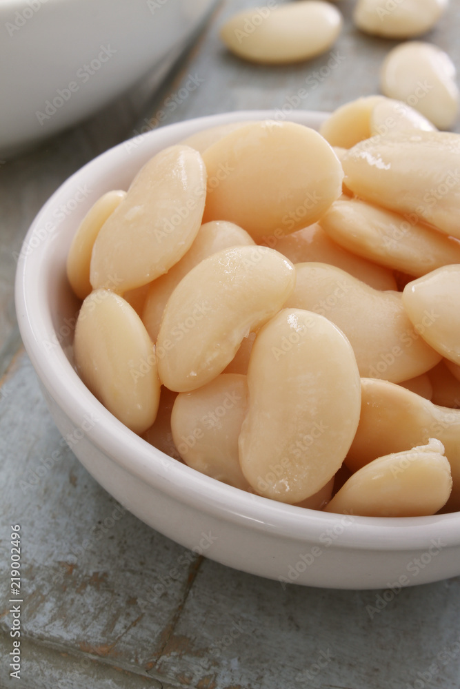 washed butterbeans in white dish washed butterbeans in white dish