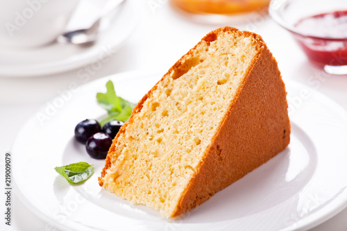 Slice Of Vanilla Cake With Tea