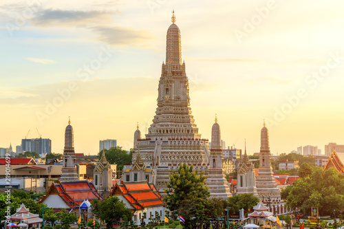 Wat Arun Buddhist Temple at sunset in bangkok Thailand. Wat Arun is among the best known of Thailand s landmarks. Temple Chao Phraya Riverside. The tourist like to take pictures and admire the beauty.