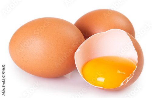 Raw eggs on white background