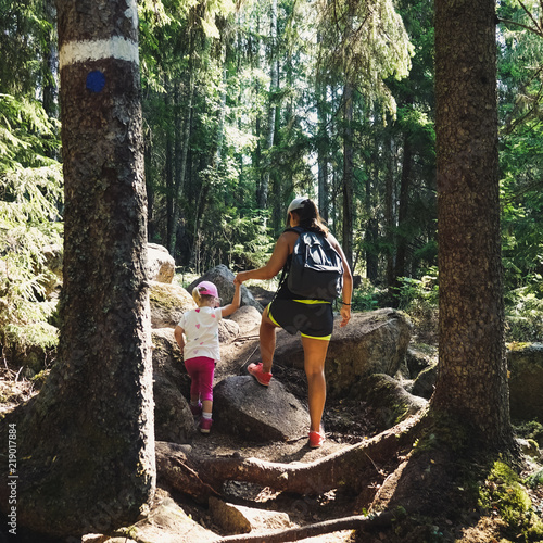 Family travel. Hiking in th...