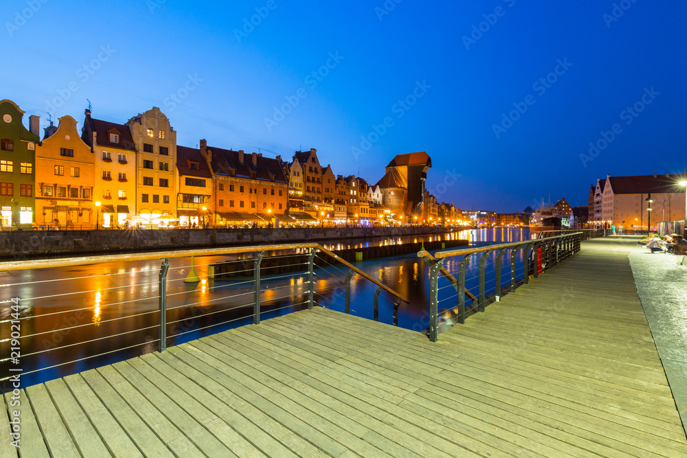 Old town of Gdansk reflected in Motlawa river at dusk, Poland Old town of Gdansk reflected in Motlawa river at dusk, Poland