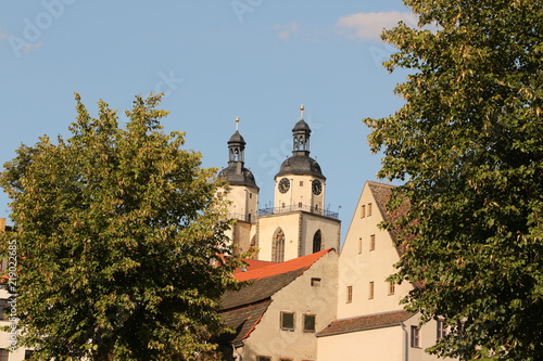 Die Türme der Stadtkirche im Zentrum von Lutherstadt-Wittenberg photo