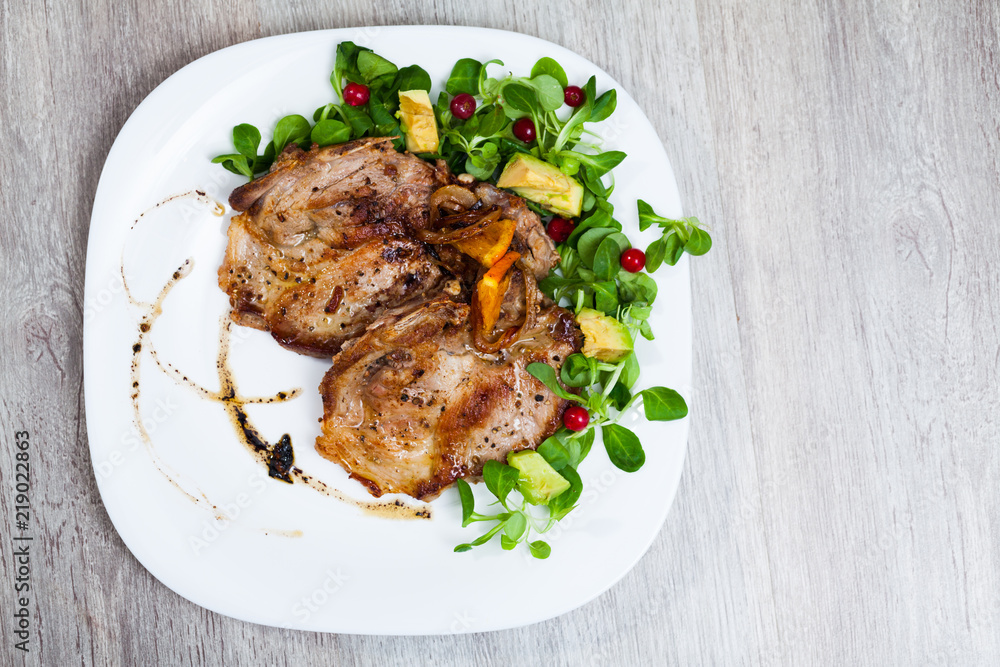 Grilled quail with vegetables and greens