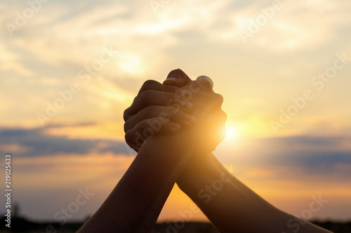 two man hands shaking over