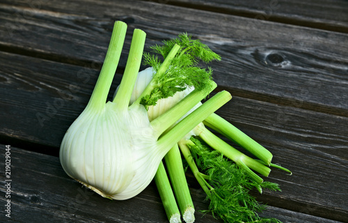 Fresh Florence fennel bulbs or Fennel bulb on wooden background..Healthy and benefits of Florence fennel bulbs.