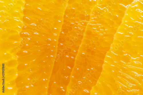 Flesh of juicy ripe orange as background or backdrop photo