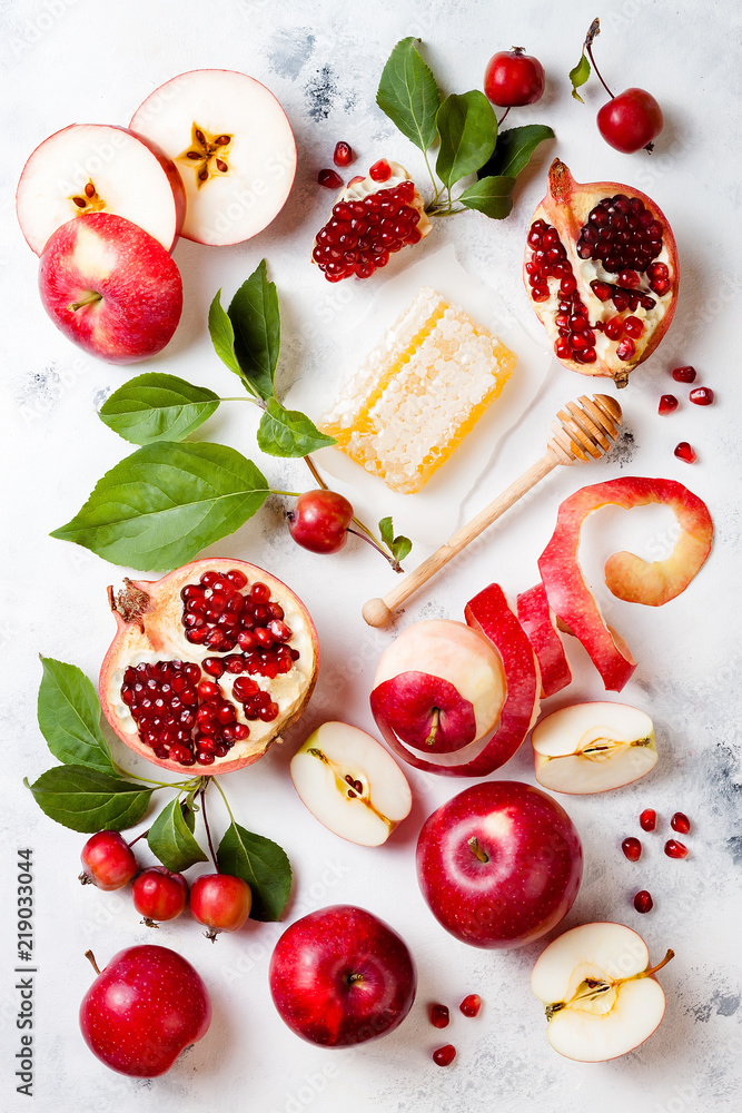 Apple, pomegranate and honey, traditional food of jewish New Year - Rosh Hashana. Apple, pomegranate and honey, traditional food of jewish New Year - Rosh Hashana.