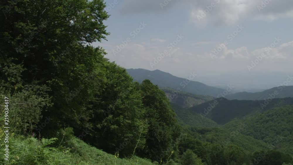 Video pan over a green mountain slopes Video pan over a green mountain slopes