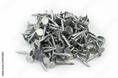 A pile of shiny, silver, galvanized roofing nails