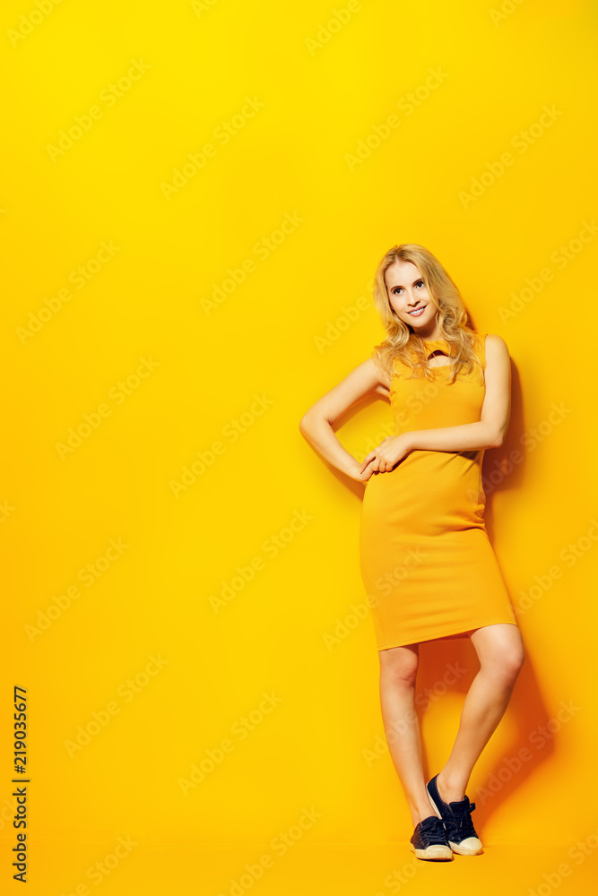 woman in yellow dress woman in yellow dress