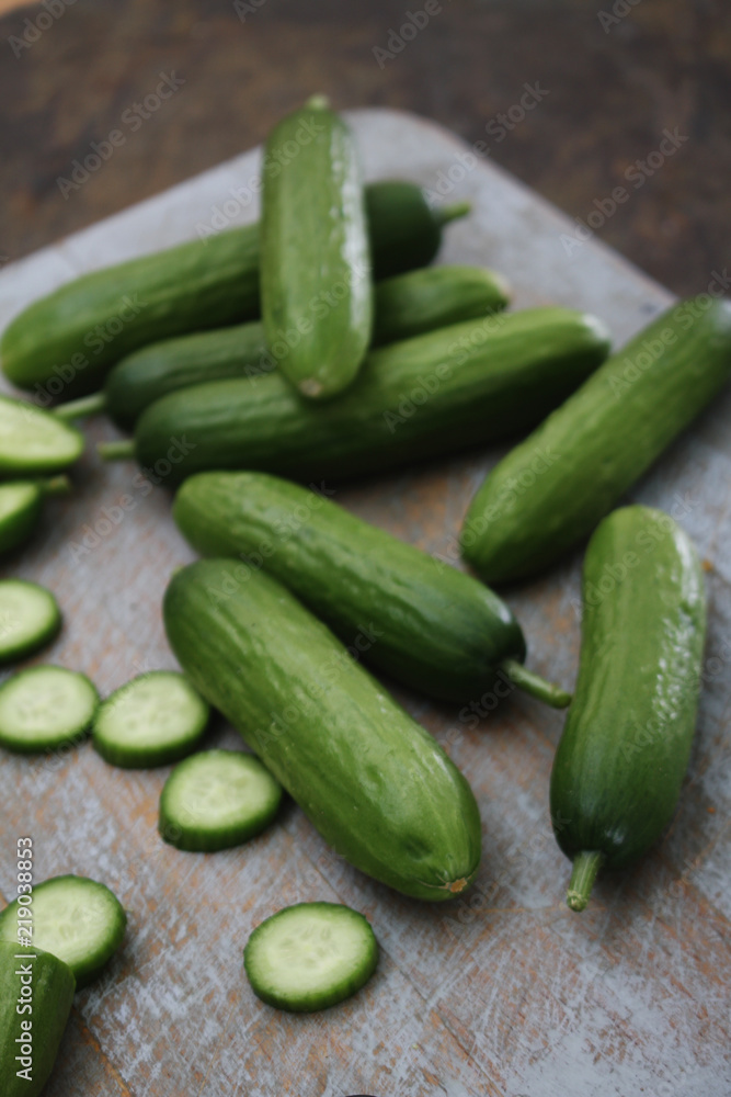 slicing baby cucumber slicing baby cucumber