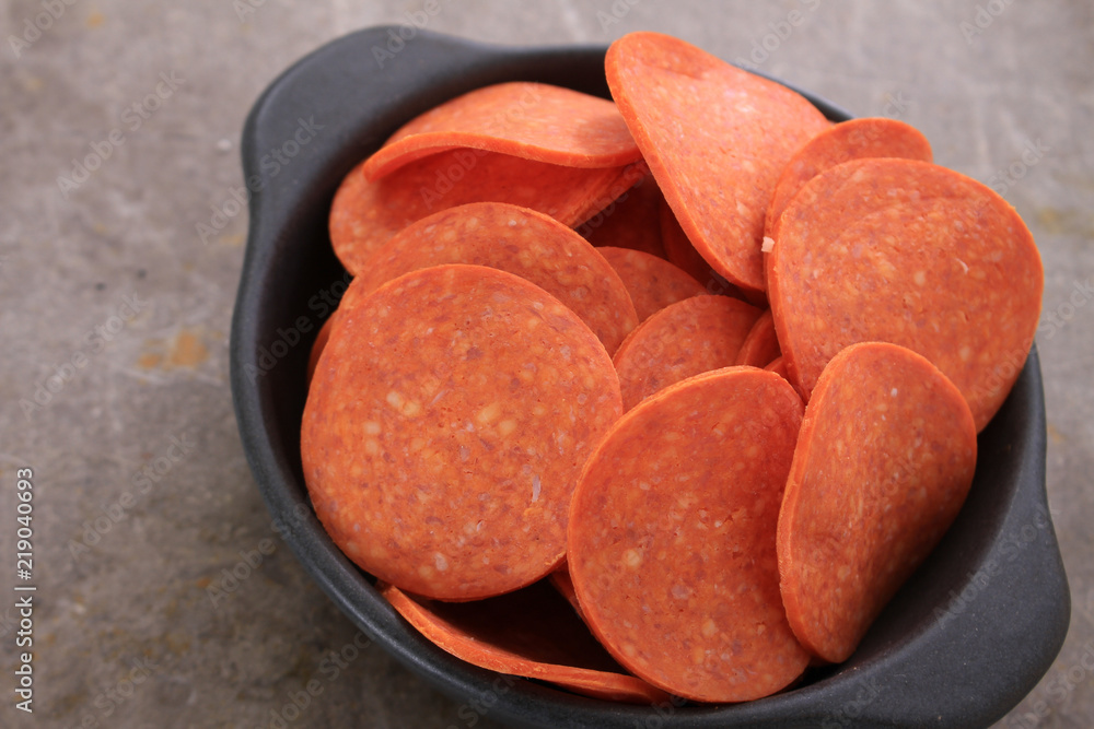 pepperoni slices in dish pepperoni slices in dish