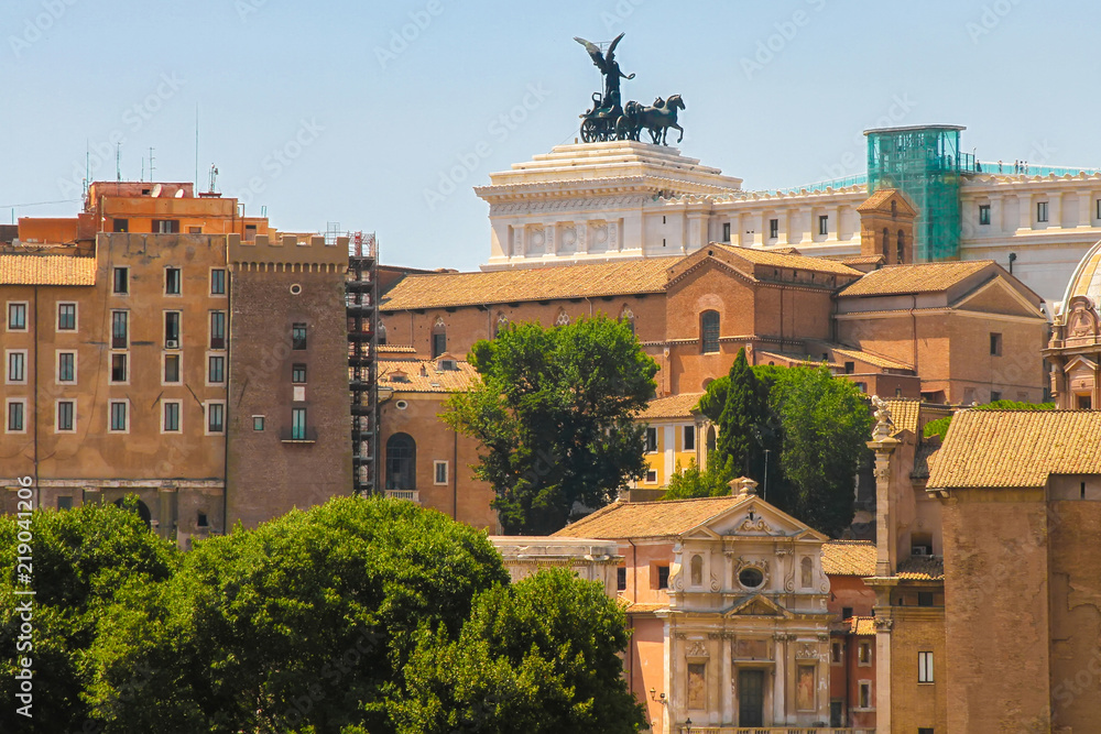 Landscape view of the historic buildings of Rome, Italy on a sunny day.