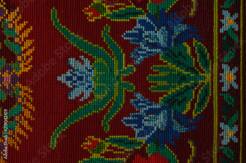 Fragment of the ornament. Embroidered in a hand-made carpet 