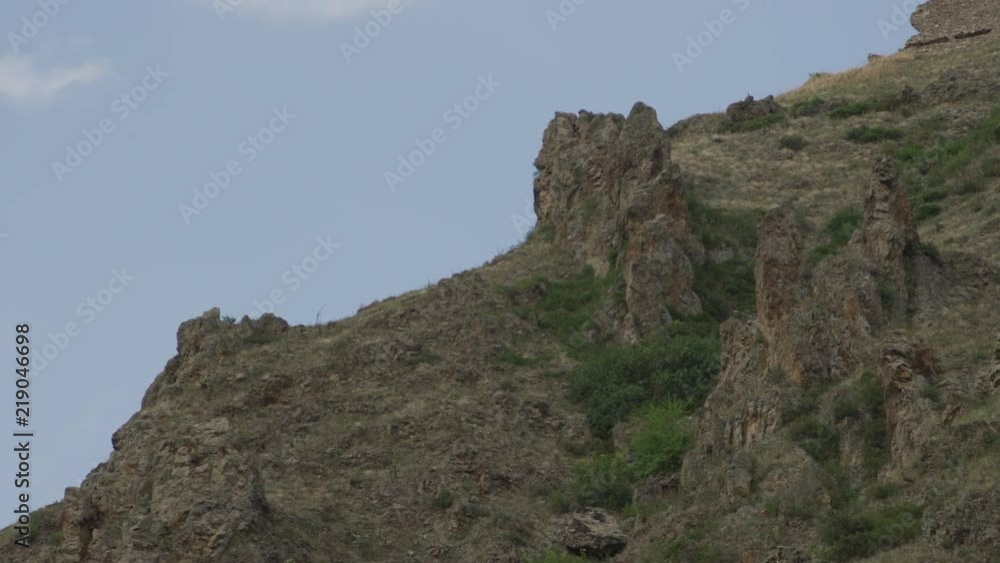 A video pan of a rocky hill A video pan of a rocky hill