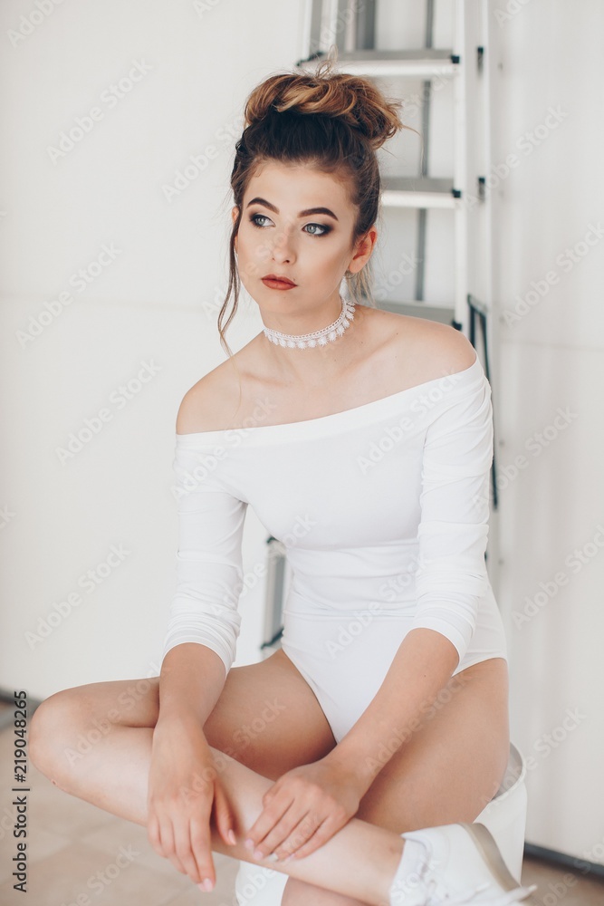 Girl in a fashionable color combination of clothes. Total white. Natural colors. Natural female beauty. Girl in a fashionable color combination of clothes. Total white. Natural colors. Natural female beauty.