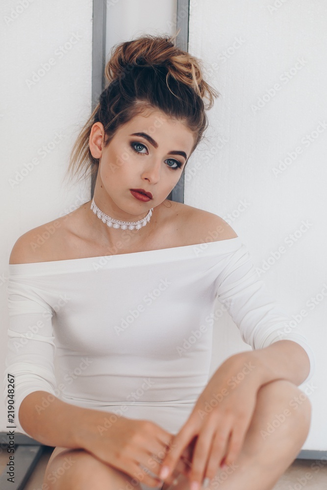 Girl in a fashionable color combination of clothes. Total white. Natural colors. Natural female beauty. Girl in a fashionable color combination of clothes. Total white. Natural colors. Natural female beauty.