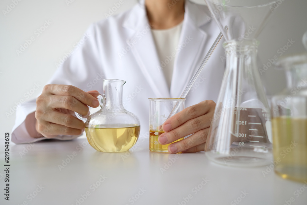doctor woman scientist making herbal medicine. doctor woman scientist making herbal medicine.