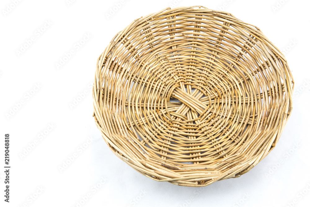 Fototapeta premium wicker basket on a white background