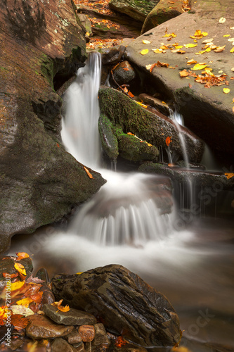 Long exposure autumn waterfall from Ricketts Glen State Park near Benton, Pennsylvania (USA).