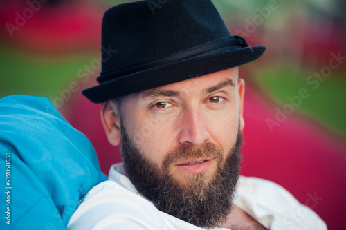 Stylish bearded man in hats. Men's Style.