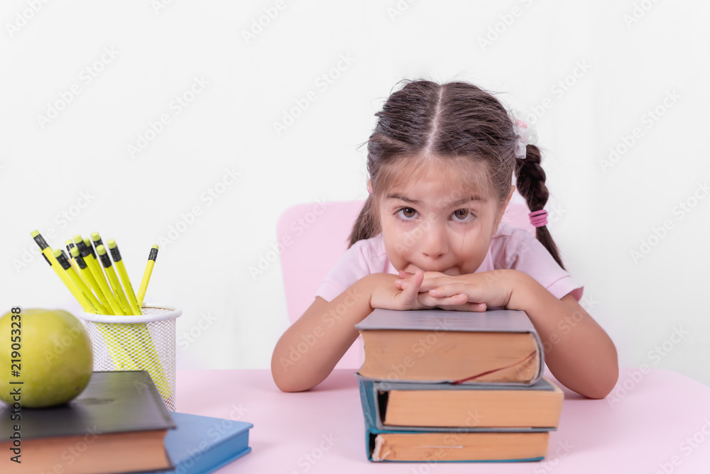 Portrait of cute little girl in school uniform Portrait of cute little girl in school uniform