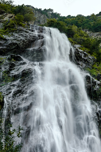 Beautiful high waterfall in swiss Alps  summer