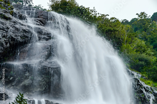Beautiful high waterfall in swiss Alps, summer