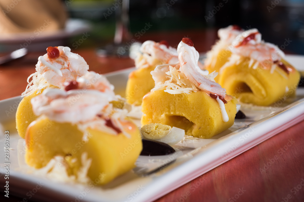 Peruvian Food: Causa Rellena, A smashed popatoes filled with crab meal. Peruvian Food: Causa Rellena, A smashed popatoes filled with crab meal.