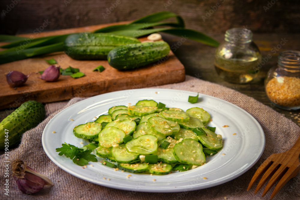 Fresh salad of cucumbers with sesame seeds. Fresh salad of cucumbers with sesame seeds.