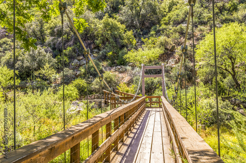 Wooden footbridge along a hiking trail in the Arizona desert