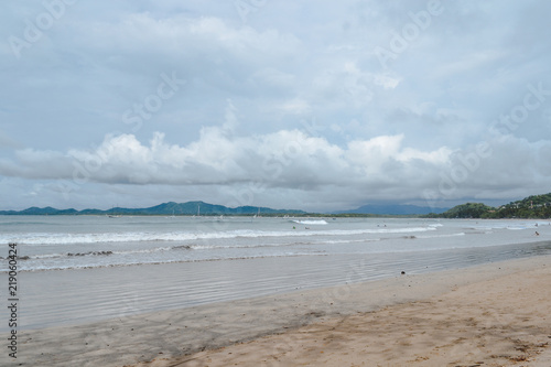 beautiful beach with cloudy sky