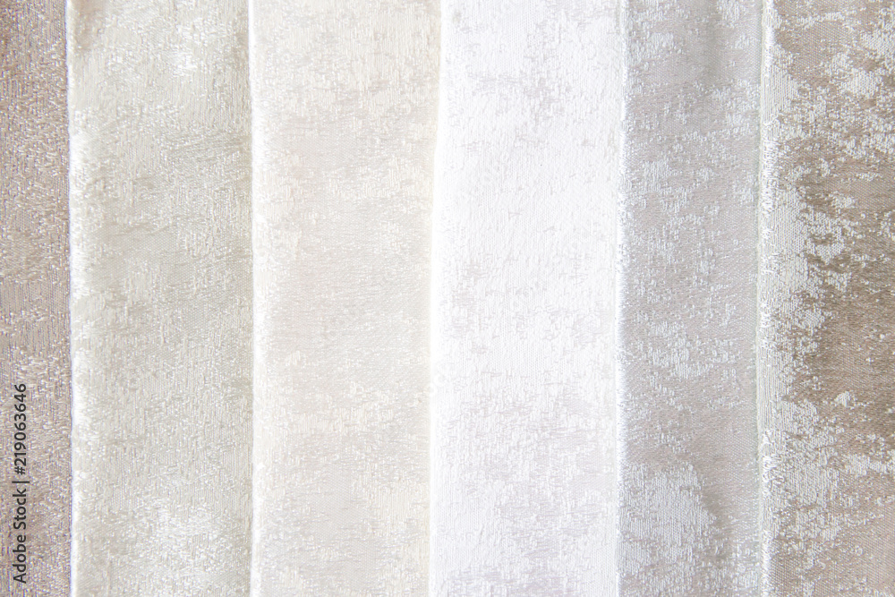 Rolls of fabric and textiles in a shop or store Rolls of fabric and textiles in a shop or store