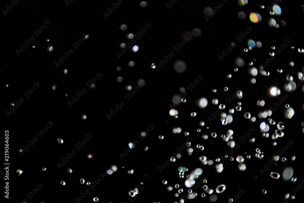 bokeh of water drops levitating in the air reflection bokeh of water drops levitating in the air reflection