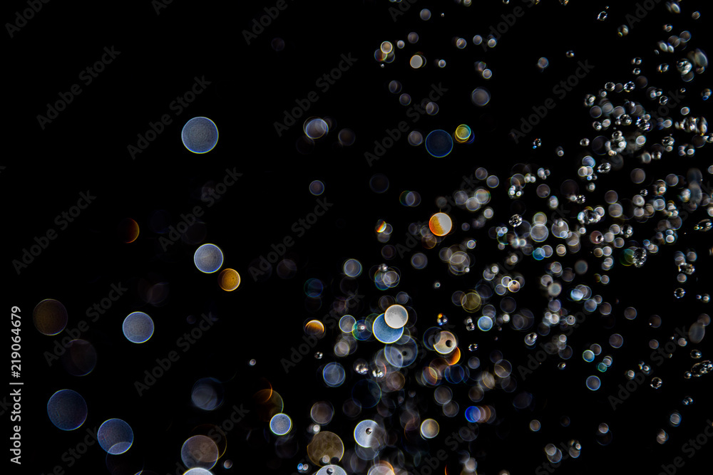 bokeh of water drops levitating in the air reflection bokeh of water drops levitating in the air reflection