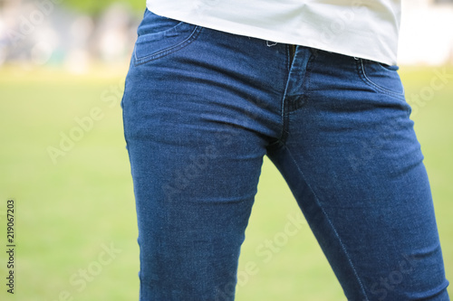 Closeup photo of Women wear blue jeans