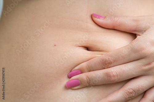 Woman belly skin