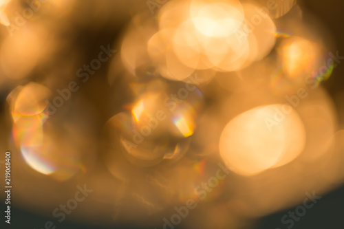 abstract background of golden bokeh from chandelier