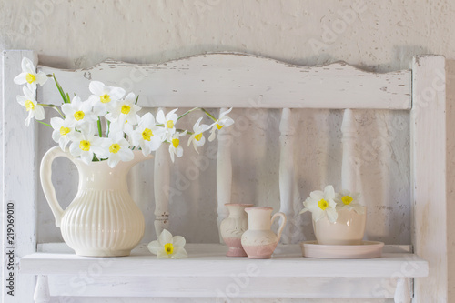 Fototapeta Naklejka Na Ścianę i Meble -  daffodils in jug on white background
