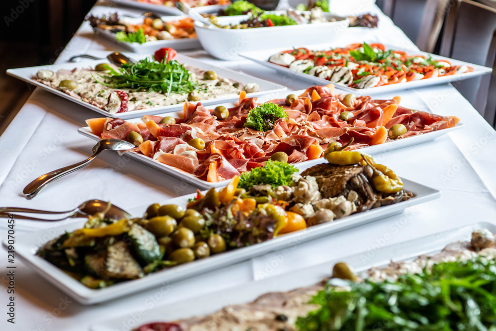 Party Brunch big Buffet table setting with Food Meat Vegetables Party Brunch big Buffet table setting with Food Meat Vegetables