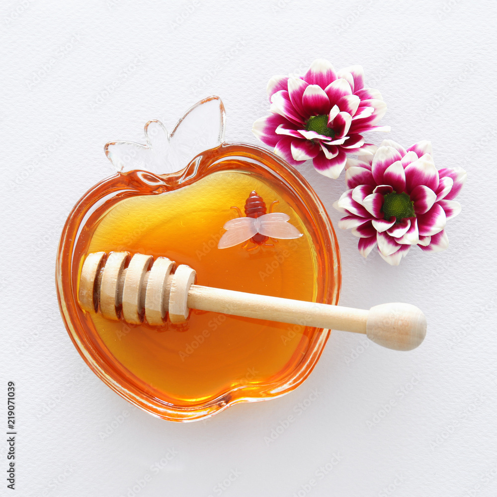 rosh hashanah (jewesh holiday) concept - honey traditional holiday symbol. rosh hashanah (jewesh holiday) concept - honey traditional holiday symbol.