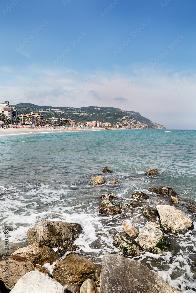Pebble beach and blue sky on background Pebble beach and blue sky on background