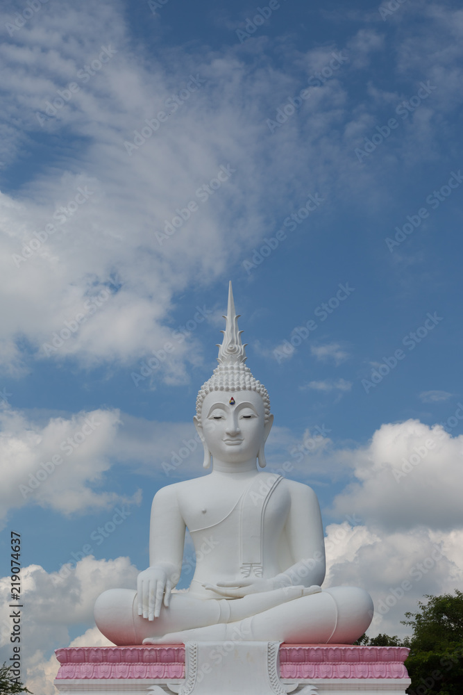 Grand White Buddha on blue sky background Grand White Buddha on blue sky background
