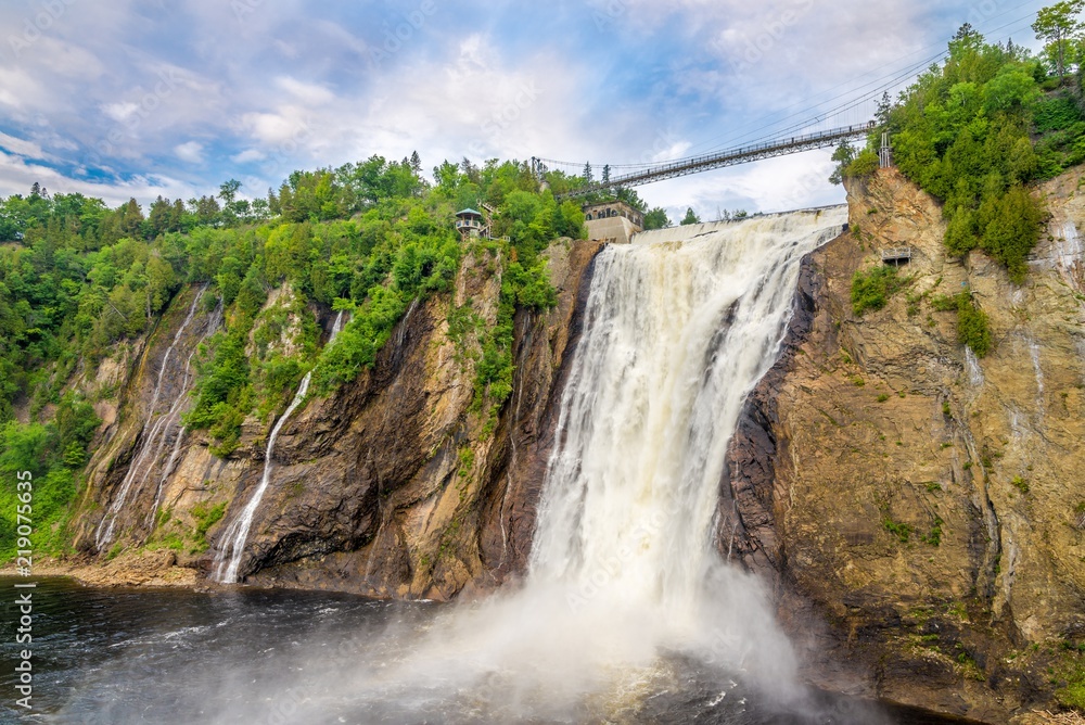 View at the Montmorency falls with bridge for pedestrians near Quebec in Canada