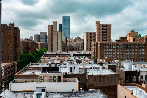 Photography Aerial New York City skyline view above rooftops