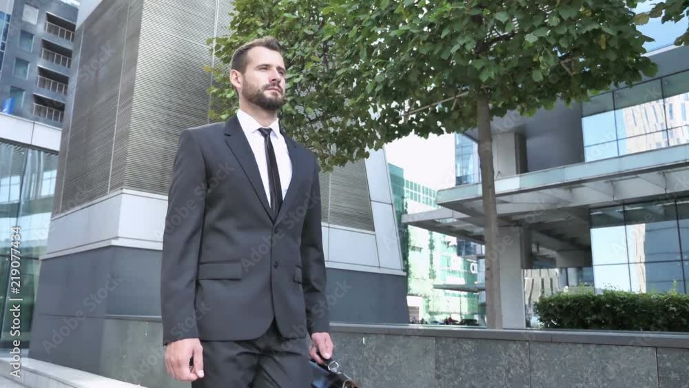 Frontal View of Walking Businessman Frontal View of Walking Businessman