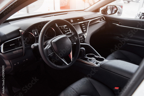 View of the interior of a modern automobile showing the dashboard © standret