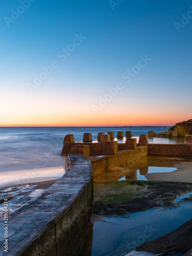 Photography Leading line view of Coogee rock pool at dawn. Sydney, Australia